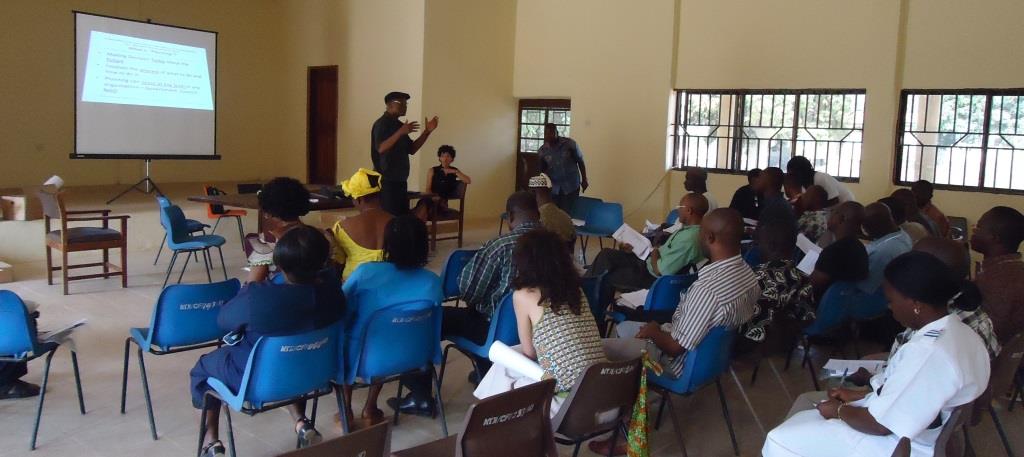 Dr Eni advising on the set-up of a community health centre in Sierra Leone