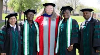 Dr. Pfalzer and t-DPT graduates: Dr. Prabhjot Kaur, Dr. Nneamaka Abanum, Dr. Olabisi Oyarekua, & Dr. Kayode Alewi.
